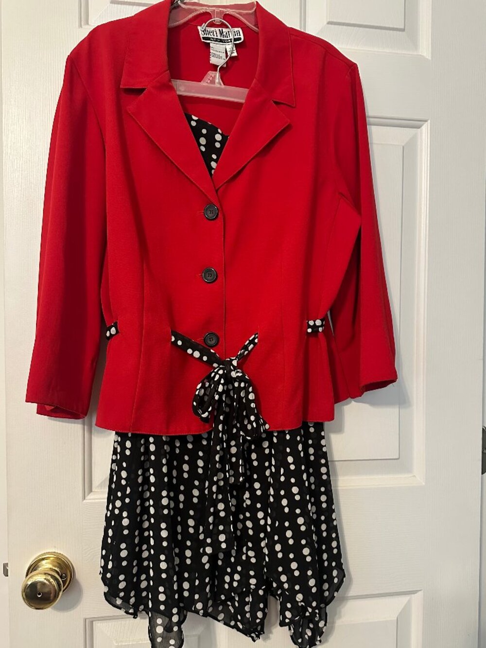 Two piece. Cute jacket with lined skirt.